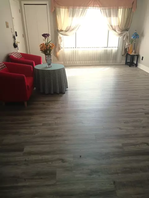 Living - 9330 Hamilton Ct #E, Des Plaines, IL 60016 photo 1 of 3