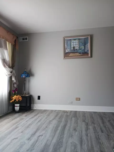Living - 9330 Hamilton Ct #E, Des Plaines, IL 60016 photo 3 of 3