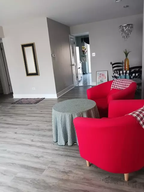 Living - 9330 Hamilton Ct #E, Des Plaines, IL 60016 photo 2 of 3
