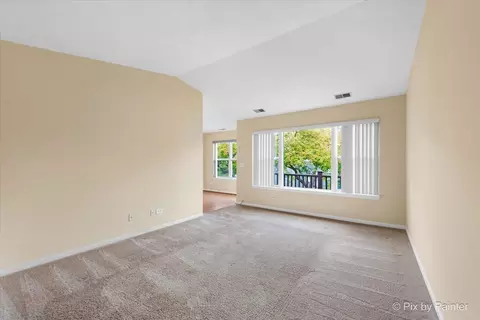 Living - 1023 Berkshire Ct #C, Elgin, IL 60120 photo 2 of 2