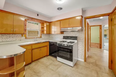 Kitchen - 7106 W Devon Ave, Chicago, IL 60631 photo 2 of 4