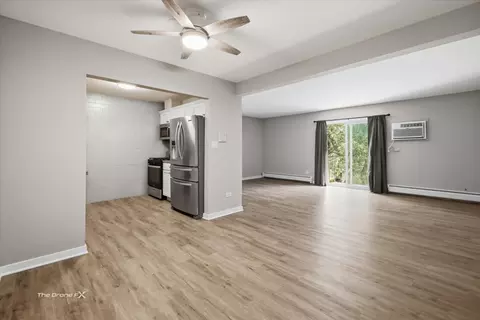 Living - 144 E Bailey Rd #L, Naperville, IL 60565 photo 2 of 2