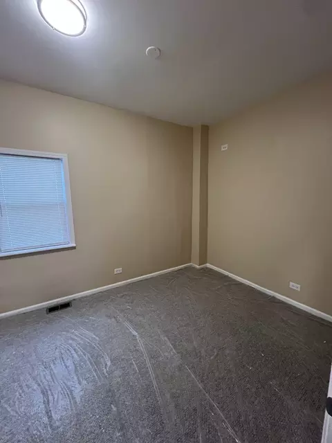 Bedroom - 7725 S Champlain Ave, Chicago, IL 60619 photo 2 of 4