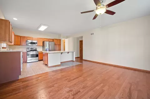 Living - 1176 Heathrow Ln, Aurora, IL 60502 photo 6 of 7