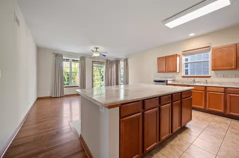 Living - 1176 Heathrow Ln, Aurora, IL 60502 photo 4 of 7