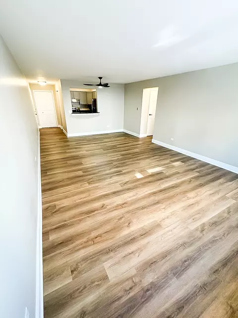 Living - 677 S River Rd #2D, Des Plaines, IL 60016 photo 2 of 3
