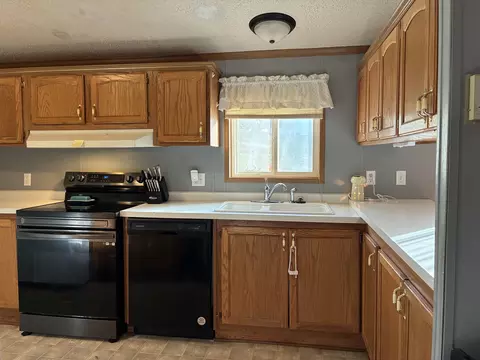 Kitchen - 820 Dewhurst St, Mount Carroll, IL 61053 photo 3 of 5