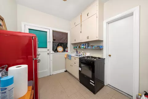 Kitchen - 11400 S Champlain Ave, Chicago, IL 60628 photo 7 of 9