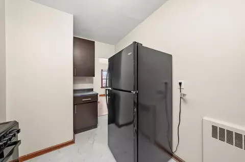 Kitchen - 11400 S Champlain Ave, Chicago, IL 60628 photo 2 of 9