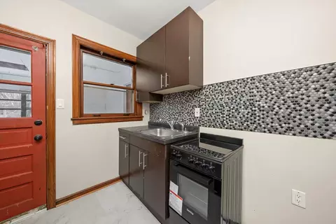 Kitchen - 11400 S Champlain Ave, Chicago, IL 60628 photo 3 of 9