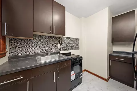Kitchen - 11400 S Champlain Ave, Chicago, IL 60628 photo 1 of 9