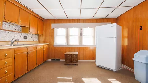 Kitchen - 305 S Harrison St, Colfax, IL 61728 photo 2 of 3