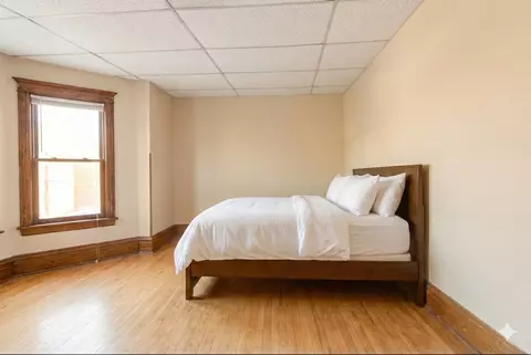 Bedroom - 4049 S Indiana Ave, Chicago, IL 60653 photo 1 of 4