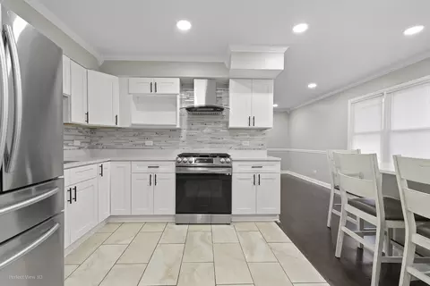 Kitchen - 240 E 148th St, Harvey, IL 60426 photo 2 of 4