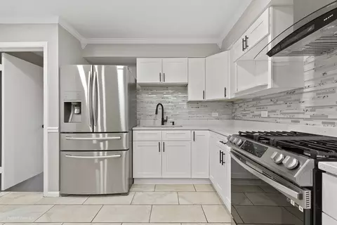 Kitchen - 240 E 148th St, Harvey, IL 60426 photo 1 of 4
