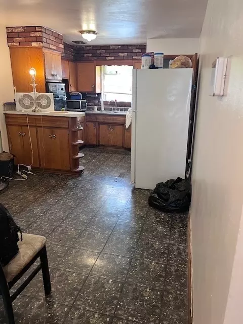 Kitchen - 315 E 87th St, Chicago, IL 60619 photo 2 of 2