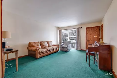 Living - 305 E Normandy Dr, Addison, IL 60101 photo 1 of 3