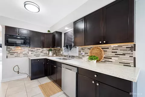 Kitchen - 281 E 163rd St, Harvey, IL 60426 photo 3 of 4