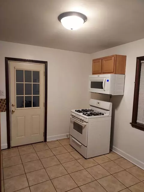 Kitchen - 104 E 150th St E, Harvey, IL 60426 photo 2 of 3