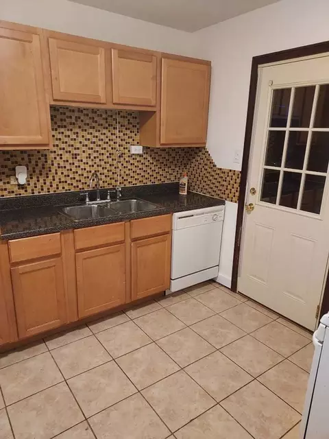 Kitchen - 104 E 150th St E, Harvey, IL 60426 photo 1 of 3