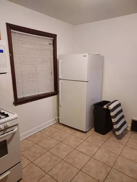 Kitchen - 104 E 150th St E, Harvey, IL 60426 photo 3 of 3