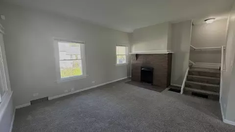 Living - 453 Addison St, Elgin, IL 60120 photo 4 of 4