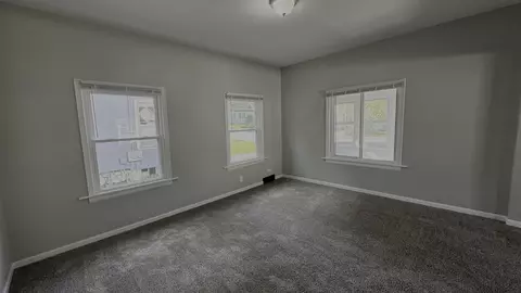 Living - 453 Addison St, Elgin, IL 60120 photo 2 of 4