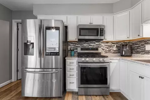 Kitchen - 610 E Roosevelt Rd, Philo, IL 61864 photo 2 of 3
