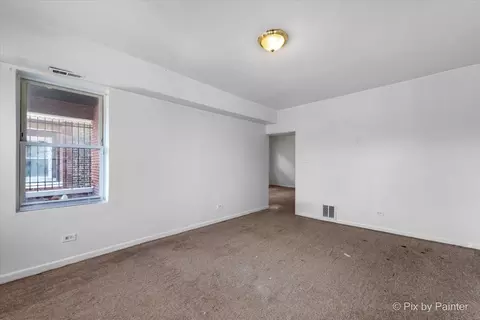 Living - 7030 S Artesian Ave, Chicago, IL 60629 photo 1 of 5