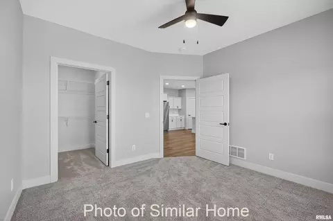Bedroom - 418 N 2nd Ave, Eldridge, IA 52748 photo 2 of 2