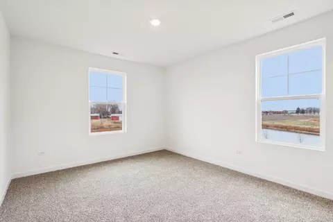 Bedroom - 1231 Wildflower Ln, Bartlett, IL 60103 photo 3 of 12