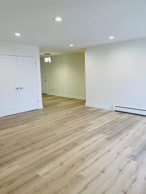 Living - 1777 Dewes St #E, Glenview, IL 60025 photo 2 of 2