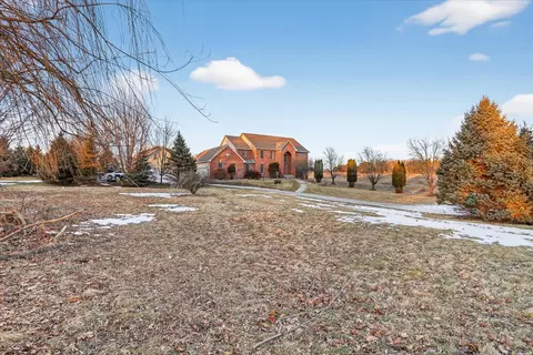 Exterior - 8306 E Crockett Rd, Roscoe, IL 61073 photo 7 of 16