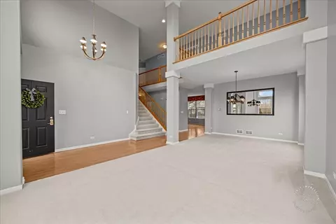 Living - 1635 Rosehall Ln, Elgin, IL 60123 photo 2 of 8