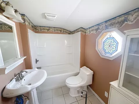 Bath - 108 S Yates St, Alpha, IL 61413 photo 1 of 1