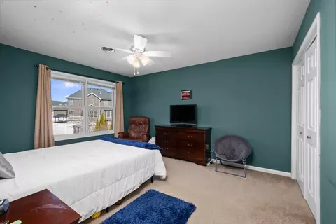 Bedroom - 408 Tombergs Dr, Eldridge, IA 52748 photo 4 of 9