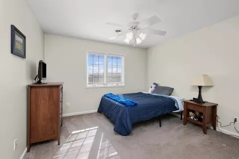 Bedroom - 408 Tombergs Dr, Eldridge, IA 52748 photo 6 of 9