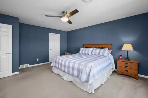 Bedroom - 408 Tombergs Dr, Eldridge, IA 52748 photo 2 of 9
