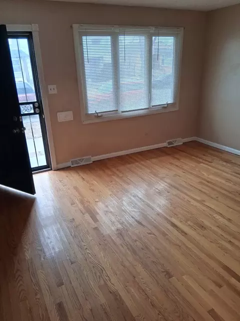 Living - 215 E 90th Pl, Chicago, IL 60619 photo 1 of 2