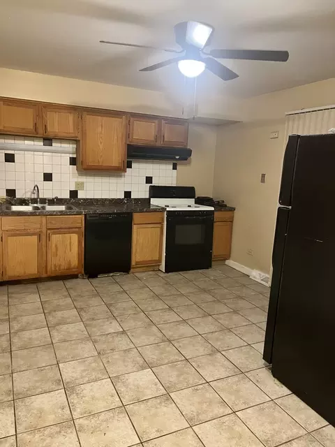 Kitchen - 215 E 90th Pl, Chicago, IL 60619 photo 2 of 2