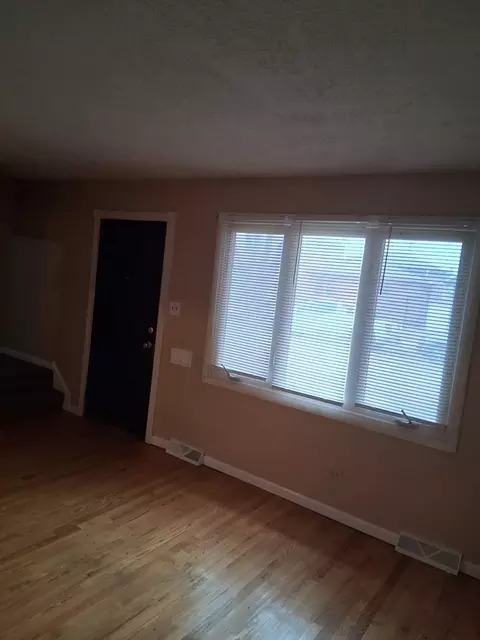 Living - 215 E 90th Pl, Chicago, IL 60619 photo 2 of 2