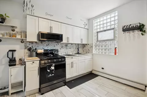 Kitchen - 2052 E 80th St, Chicago, IL 60617 photo 2 of 4