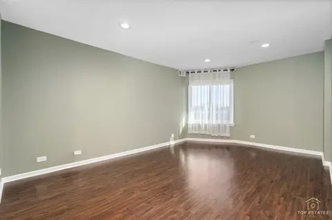 Living - 5450 Astor Ln #415, Rolling Meadows, IL 60008 photo 10 of 11