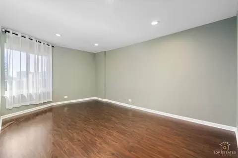 Living - 5450 Astor Ln #415, Rolling Meadows, IL 60008 photo 9 of 11