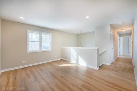 Living - 305 E Country Dr, Bartlett, IL 60103 photo 2 of 7
