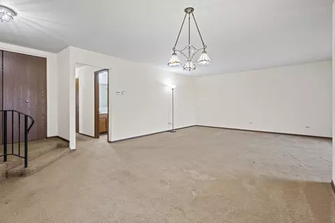 Living - 9752 Mill Dr E #E2, Palos Park, IL 60464 photo 3 of 3