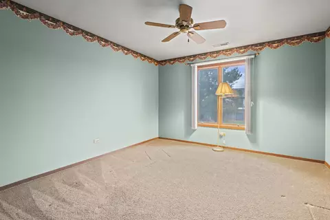 Bedroom - 9752 Mill Dr E #E2, Palos Park, IL 60464 photo 4 of 6