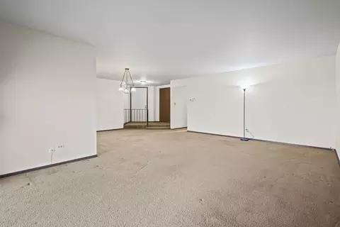 Living - 9752 Mill Dr E #E2, Palos Park, IL 60464 photo 2 of 3