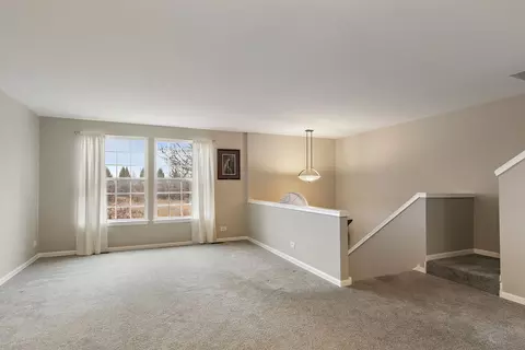 Living - 1135 Reserve Dr, Elgin, IL 60124 photo 2 of 3