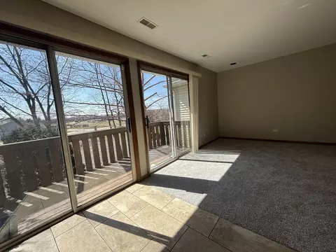 Living - 615 Mallard Ct #C2, Bartlett, IL 60103 photo 4 of 8
